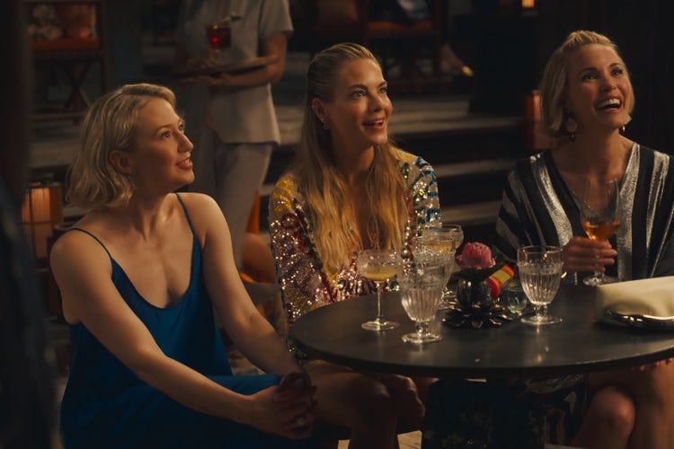 A scene with Carrie Coon, Leslie Bibb, and Michelle Monaghan from season 3 of 'The White Lotus' on HBO and Max.