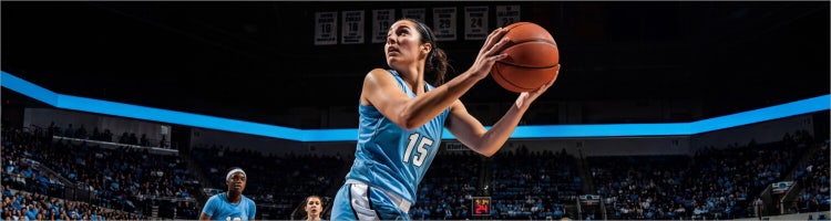 An image of a woman playing basketball.