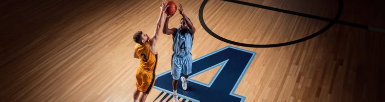An image for two basketball players for the Final Four games on Sling TV.