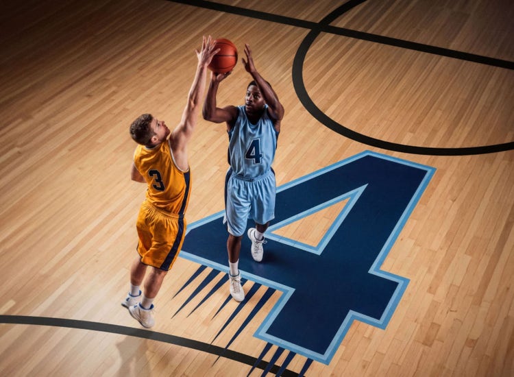 An image for two basketball players for the Final Four games on Sling TV.