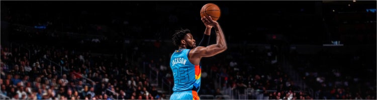 An image of a player in a blue jersey shooting a jump shot to promote the NBA Conference Finals on Sling.